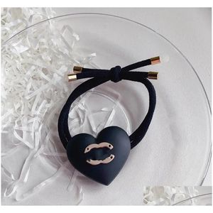 Accessori per capelli Designer Corda Sweet Black Love Scrunchie Elastico Logo Elastico Marchio di alta qualità Porta coda di cavallo Luxury Drop Deli Ot3Ky