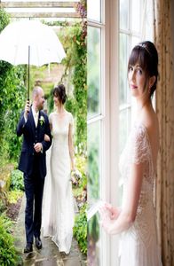New Plus Size Wedding Dresses Open Back Vintage Beach Bridal Gowns Sheath Deep VNeck Short Sleeves for Boho Wedding Wear5790351