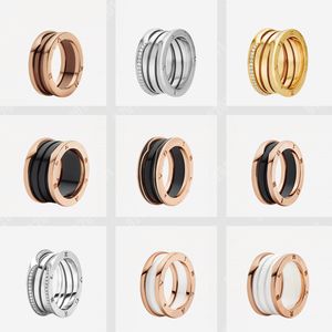 Projektant czarno -biały ceramiczny spiralny tytanowy stal 18K Rose Gold modny butikowy pierścień butikowy