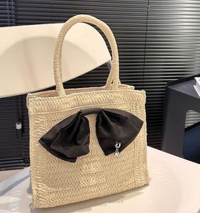 Straw laid Underarm Bow Bag Luxury Designer Cross body bags totes lady Portable Shoulders bag Cosmetic Bags Cases Wander wicker woven handbag purchases