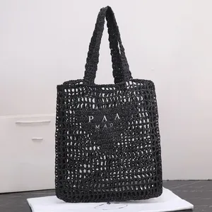 10s Tote Beach Straw Bag Designer Torba Wysoko jakościowa moda tkana na letnią czarną morelową podróż na świeżym powietrzu Duża torebka
