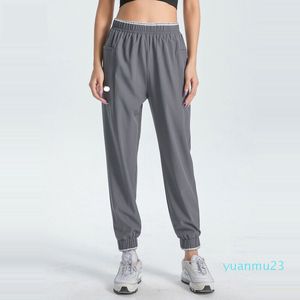 LULULEMENLY KVINNOR JOGGING YOGA NINTH PANTER Big Pocket Fitness Soft High midje Joggger Casual Pants Drawstring Ben Sweatpants Light Colors för sommaren