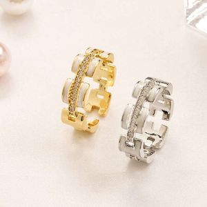 Anéis de casamento Designer Mulheres Amor Anel de Luxo 925 Prata Anéis de Ouro Cobre Moda Jóias Anel Espiral Festa de Casamento Diamante Alfabeto Acessório Presente 2024