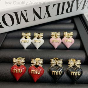 Designer miumiu earrings Miaos Bow Knot Full of Diamond Love Earrings 2023 New Unique Design Sense High End Light Luxury Earrings for Women