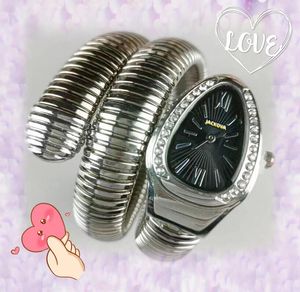 GODKVALITET KVINNOR DIAMONDER RINGARVIKTER Fashion Style Dress Watch Lady Bee Snake Japan Quartz Movement rostfritt stål Remmen Enkel oval form armbandsur presenter