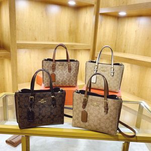 Tasarımcı çantaları% 90 indirimli daha ucuz moda ve büyük kapasiteli tote çantası 2024 yeni stil straddle omuz el tipi kadın