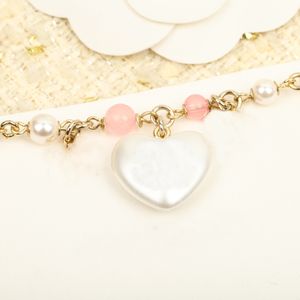 Designer Fashion Women's Heart Armband Pearl Chain Armband med pärlor, halsband, örhängen 26245