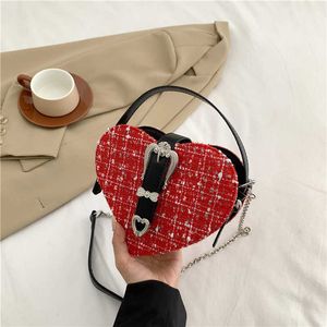 Damentasche Herbst Einfache und modische Pfirsichherz gestrickte handgehaltene diagonale Kreuzliebestasche 240315
