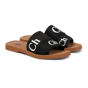 Hot Designer slippers Slippers Sandals Wooden flat mules The brand's O logo-embellished insole The simple design makes this flat classic and stylish wooden sole 0910