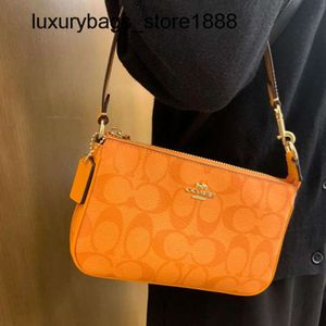 Fabrik högkvalitativ grossist Olay New Womens Bag Classic Orange Old Flower One Shoulder Underarm dragkedja