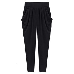 Plus Size 8XL 140kg Pantaloni stile harem da donna Pantaloni a pieghe in vita elastica alta Tasche Pantaloni larghi alla caviglia da donna sottili e sottili 240229