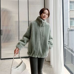 Tutte le particelle di lana, pelliccia composita Haining, pelliccia di agnello integrata, versatile autunno e inverno nuova calda versione coreana per donna 7126,