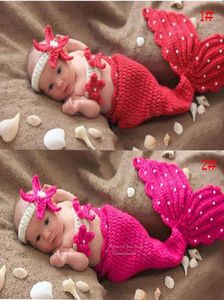 新生児の小屋の小道具の赤ちゃん服女の子服人魚の幼児衣装かぎ針編みの手作りの衣装7511486