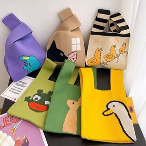 Borsa regalo per donna, borsa lavorata a maglia colorata retrò dal design retrò. Borsa all'uncinetto