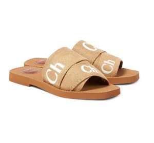 Slippers Slippers Slippers Sandals خشبية مسطحة البغال ، النعل المبلوم بالعلامة التجارية.