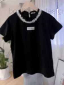 Женские блузки Рубашки дизайнерского бренда 2024 Новый продукт Тяжелая промышленность с коротким рукавом из бисера D7M6