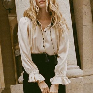 DOEN SIMONE TOP I VIT Tidig vår Ny produkt Lapel hängande rep Tassel Buckle Gentle Lady Silk Top Lantern Sleeve Shirt