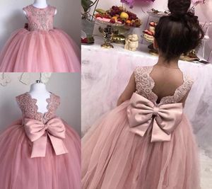 Pink Flower Girls Dresses Sheer Jewel Neck Sleeveless Lace Applicques Tulle Girl Pageant Gowns Födelsedagsklänningar med Big Bow6582657933