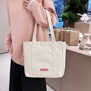 Borsa in tela, artistica alla moda, versatile borsa a tracolla singola per giovani donne, borsa ad alta capacità dal Giappone, Corea del Sud, borsa per la spesa 240315