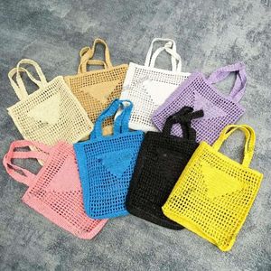 클래식 디자이너 Raffia Tote Luxury Beach Bag Brands 중공 문자 아웃 문장 핸드백 토트 패션 종이 짠 크로스 바디 여성 여름 여행 핸드백 숄더백