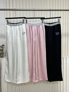 Pantaloni a triangolo da donna con motivo a triangolo in vita alta elastica primavera estate Pantaloni a gamba larga larghi oversize per donna Moda 3 colori