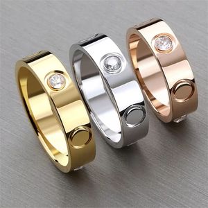 Casais anéis de ouro para mulheres homens amor anel designer de noivado presente de casamento joias de aço inoxidável clássico unissex masculino feminino anel de diamante anel de unha