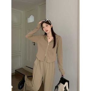 Koreansk version Sport och fritidssats Womens Slim Hoodie Jacket Wide Leg Pants Two-Piece Set