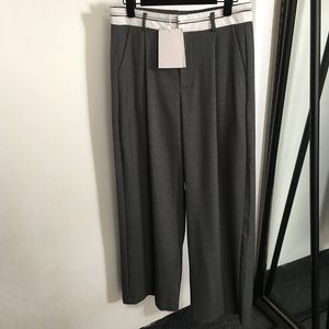 Pantaloni in tessuto con lettere Pantaloni eleganti da donna Pantaloni casual a vita alta Pantaloni firmati tascabili a 2 colori Pantaloni con pagliaccetti Luxur