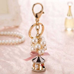 Designer chaveiros colhedores chaveiros bonito chaveiro pérola cristal corda carrossel para mulheres chaveiro jóias presente acessórios llaveros para mujer dropship miri2