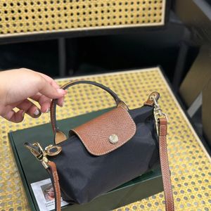 Designer Bag handväska Topte Bag Messenger väskor Luxury Tote Canvas Mini Handhållen baguette axelväska spegel kvalitet crossbody mode satchel hobo modeväska