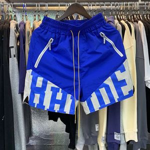 RHUDE Homens Respirável Praia Shorts Homens Mulheres Casual Malha Faixa Respirável Oversize Rhude Shorts Cintura Shorts Com Cordão Frete Grátis para Preto e Branco 111