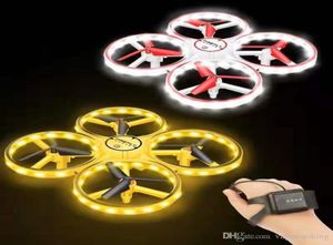Il più nuovo 3 in 1 RC Orologio da polso a induzione Controllo dei gesti Mini UFO Quadcopter Drone con fotocamera LED Light Levitation Induction Aircraf2355246