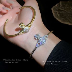 West Empress Dowager Planet Zirkon offenes Armband, kleines Design, modischer und vielseitiger Stil, Armband