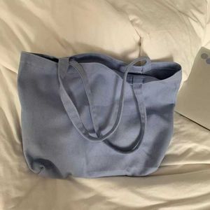 Bag na płótnie z pojedynczym ramię koreańską edycję na Instagramie Student Mała i wszechstronna, prosta i duża pojemność torba na zakupy 240315