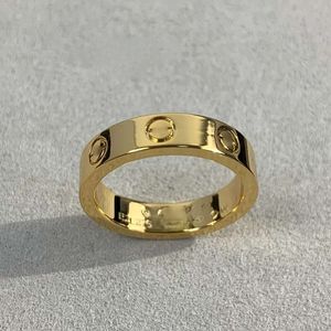 デザイナーはダイヤモンドなしの金色の狭いリングを愛するカウンターボックスカップルリング付きの公式複製5A箱付きの絶妙なギフト
