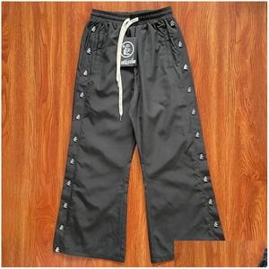 Mens Pants Hellstar Casual Nylon Button Pant Black Designer Högkvalitativ Woemn Men Jogger Fashion Hip Hop Long Lovers Street Drop Deli OTQ4K