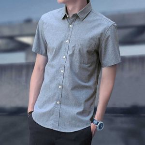 Camisa de manga curta dos homens verão novo coreano casual topo dos homens cinco manga oxford girando camisa branca polegada moda