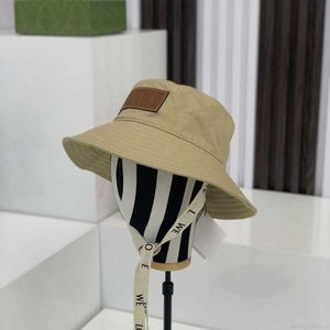 Tasarımcı Yüksek Versiyon Tasarımcı Hat Lowe Yeni Serisi Yaz Şerit Tuval Güneşlik Şapkası Geniş Memul Balıkçı Yıldızı Aynı Mavi Erkek ve Kadın Tarzı LBVT VSB5