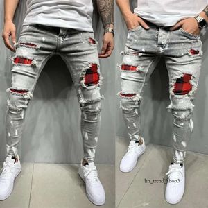Mężczyźni Slim-Fit Rise Męskie dżinsy Paintowane moda Patch żebrakowe spodnie jumbo męskie ołówek hip hop kropla 501