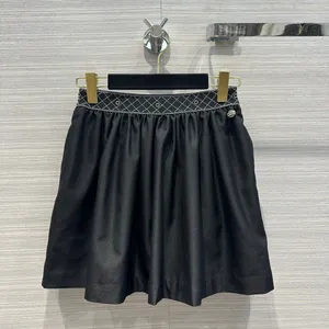 デザイナー滑走路2024夏の弾性刺繍ブラックエレガントスカート女性ハイウエストAラインレディミディスカート