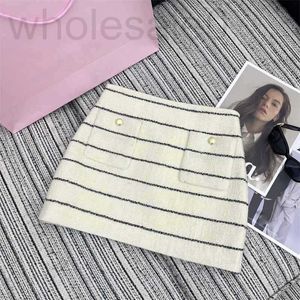 Skirts designer 24 Early Spring New Nanyou Miu Celebrity Style Back Letter Sticker Embroidered Thick Tweed Stripe High Waist Small A Half Skirt NYSP