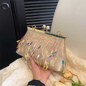 Axelväskor kvinnor designer handväskor paljett tyg väska kedja clip mode fjäder tassel liten fyrkant 240311
