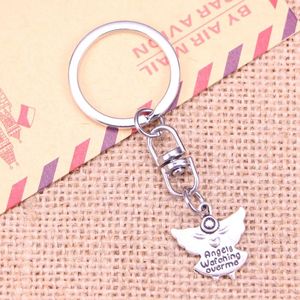 Keychains 20st Fashion Keychain 20x19mm Guardian Angel Watch Over Me Pendants Diy Men smycken bil nyckelkedja souvenir för gåva