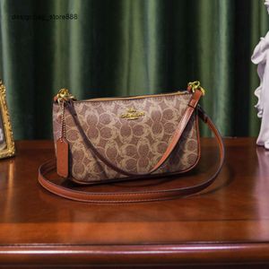 Bolsas elegantes dos principais designers Nova bolsa moderna feminina versátil e exclusiva de couro macio na moda nas axilas Crossbody portátil Mahjong