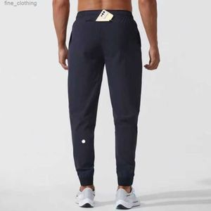 LululemenI Calças compridas masculinas para corrida, roupa esportiva de ioga, secagem rápida, cordão, bolsos de academia, calças de moletom, casual, cintura elástica, Fiess lgk886