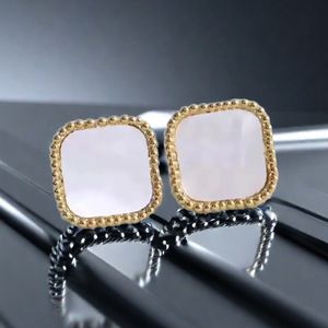 Luxury gold earrings designer High Quality New Korean Fashion Gold Plated Clover Flower Shaped Rhinestone Stud Earrings for Women Ladies Jewelry Gift