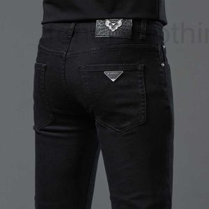 Jeans masculinos marca de designer Hong Kong incolor outono e inverno jeans pretos grossos, ajuste fino elástico, pés pequenos calças compridas versáteis, calças 4RCW