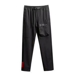 Pantaloni casual da uomo Pantaloni da jogging Pantaloni sportivi Pantaloni Ricamo Budge Poacket Coulisse Regolare Outwears Capris Track Pant Asian M-3XL