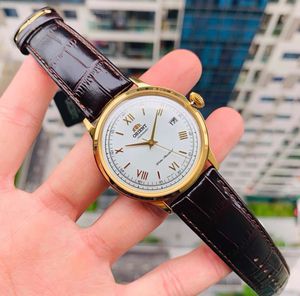 Dongfang Shuangshi Orient Blasenspiegel kleiner blauer Nadel Business Watch Vintage Belt Automatic Mechanical Watch Herren