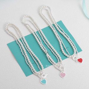 مصمم Tiffay و Co Necklace New Love Love Dropping Glue Double Lear Pearl موافقة نمط متعددة الاستخدامات